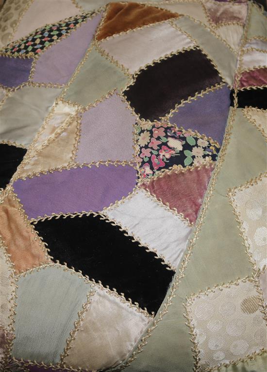 Three patchwork quilts